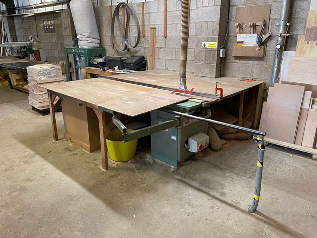 Table saw for cutting sheet materials